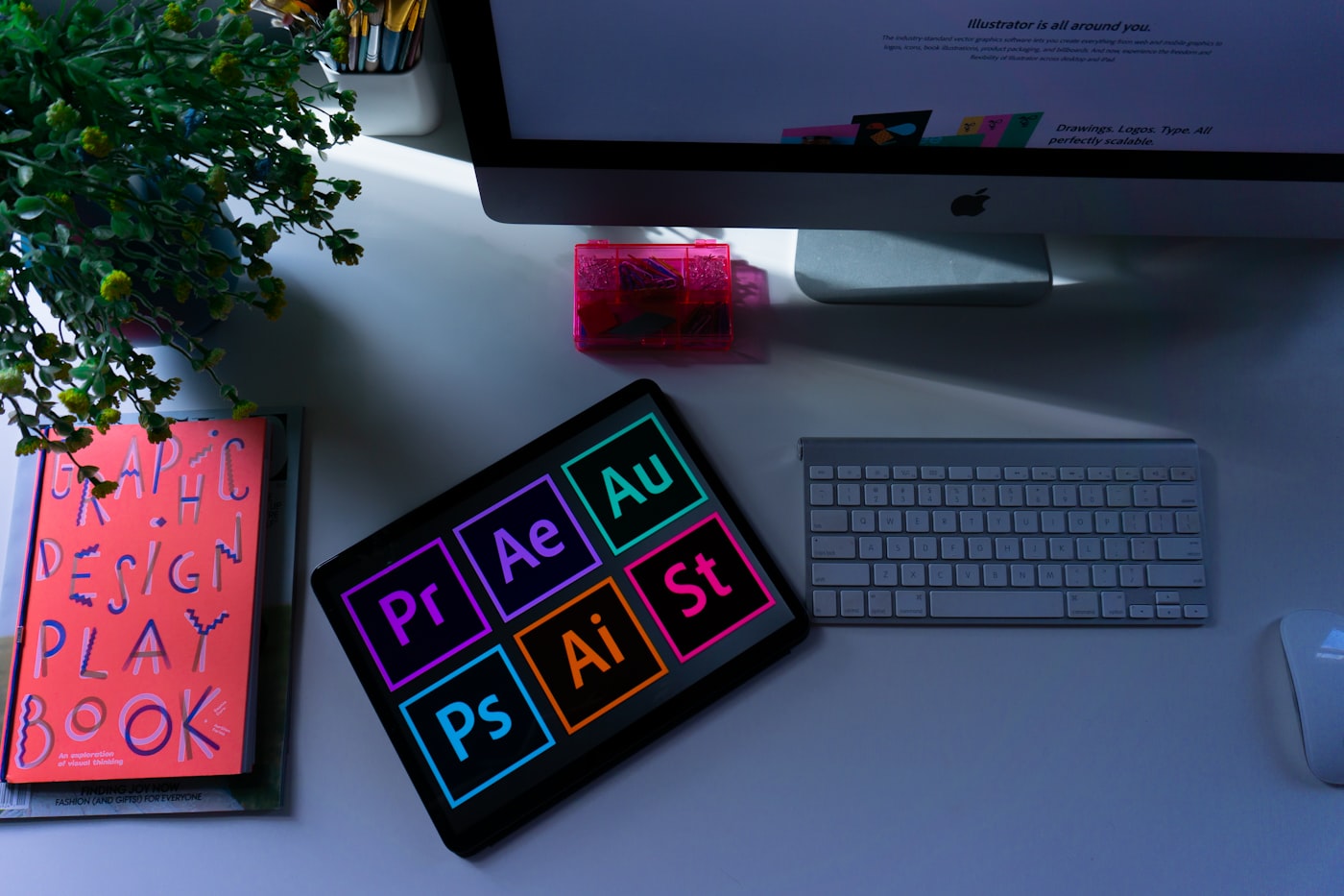A creative workspace with ad designs laid out